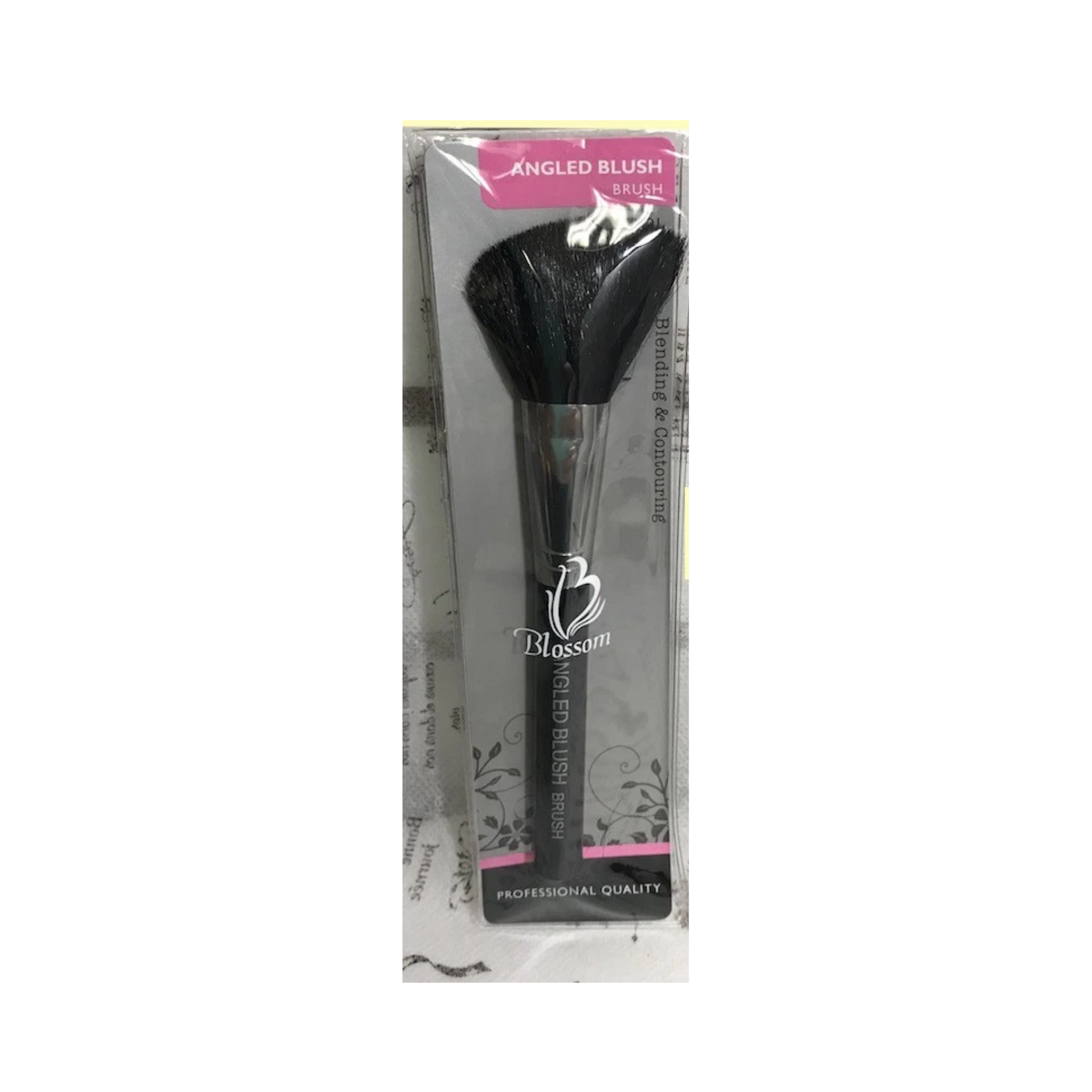 Angled blush makeup brush for blending contour and blush on cheeks