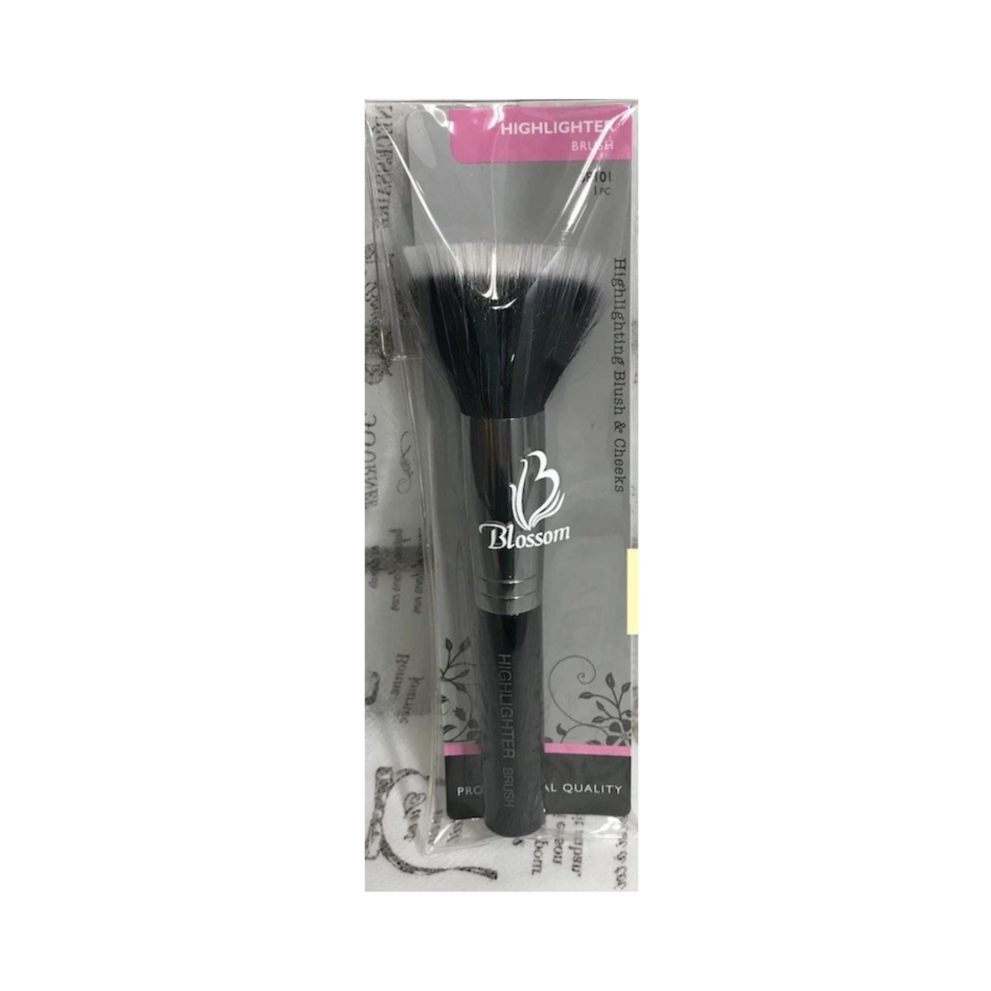 Highlighter makeup brush for applying glow to cheeks and high points of the face