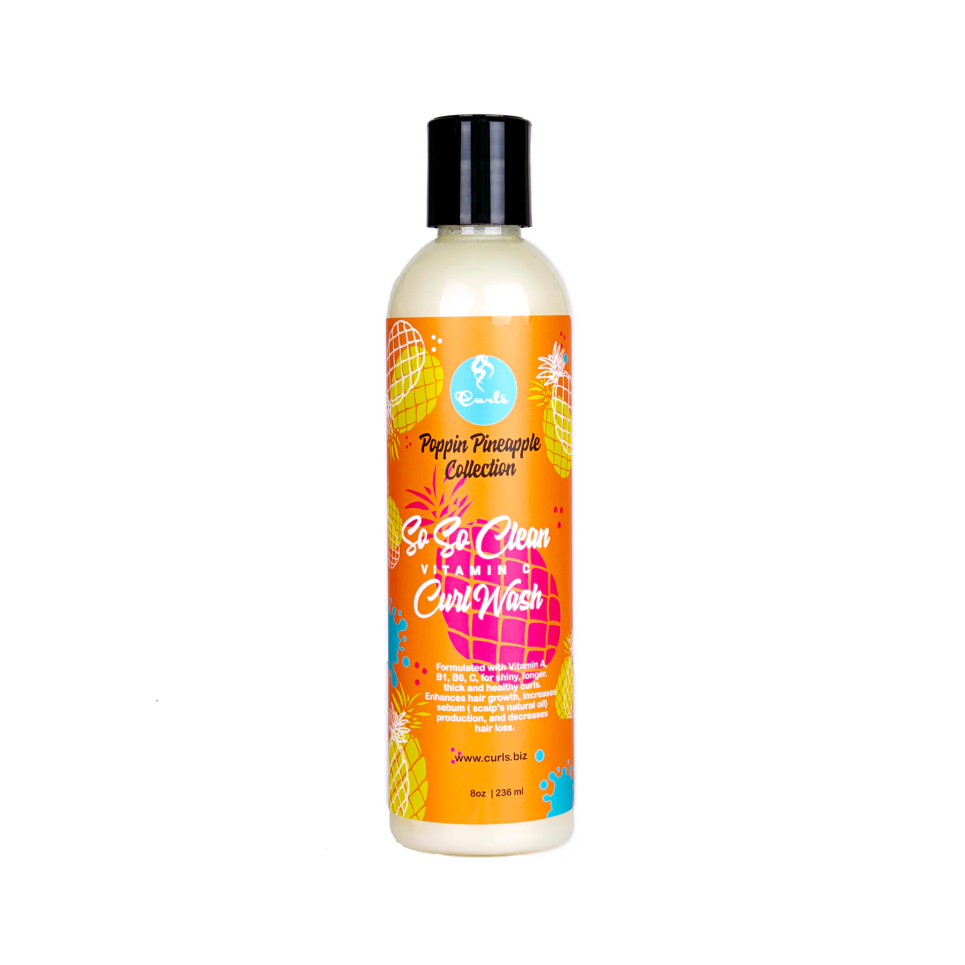 Orange bottle of vitamin C curl wash designed to hydrate and cleanse curls.
